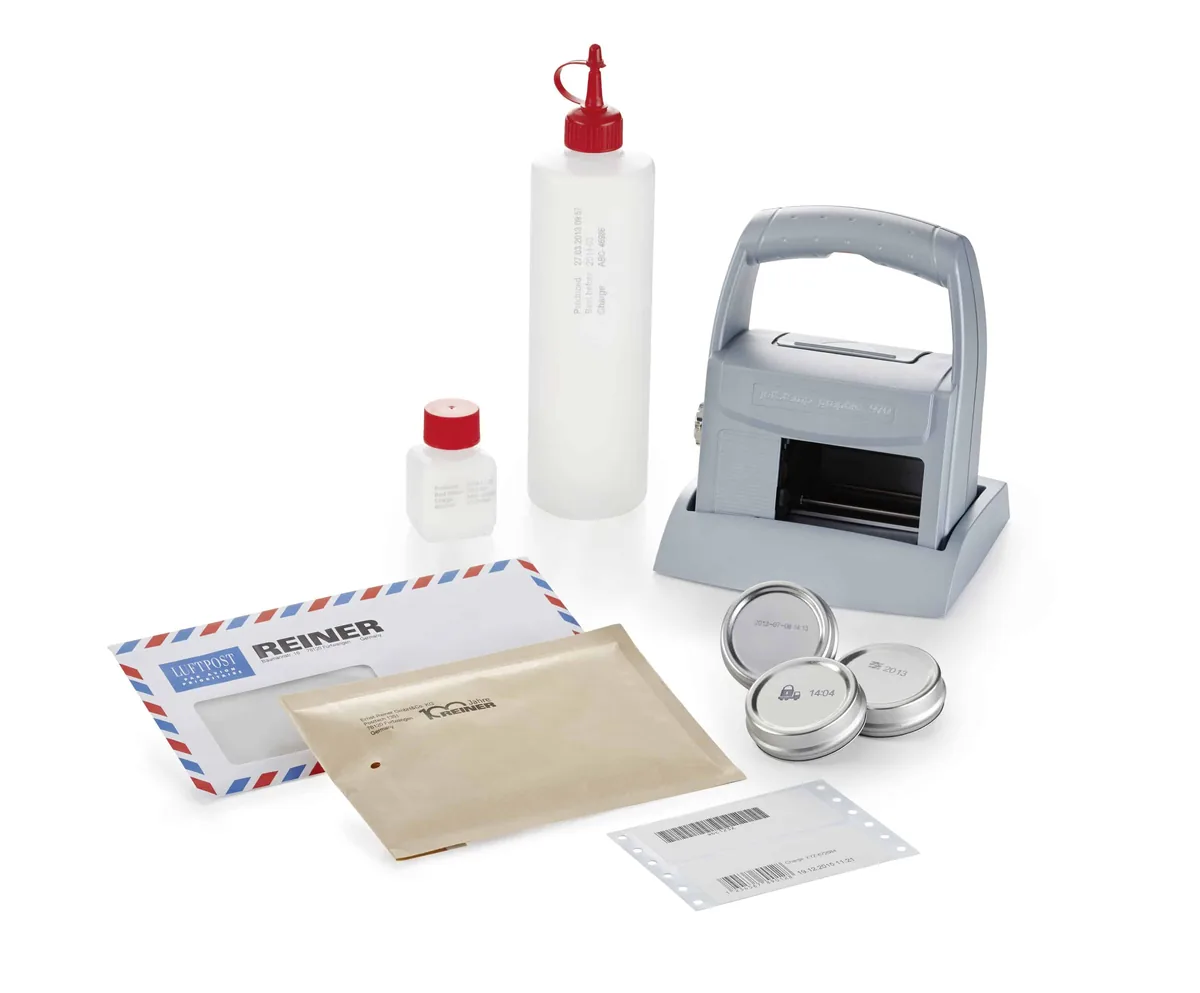REINER jetStamp graphic 970 with ink and printed envelopes